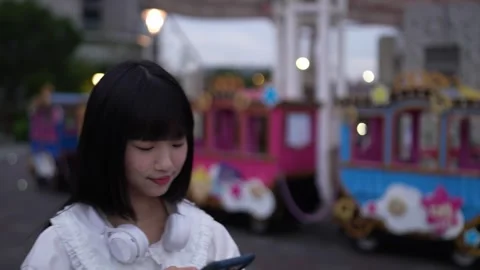 Woman Standing Using Smartphone Evening Amusement Park Taiwan Stock-Footage 282151072