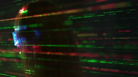 The woman stands on the laser rays background Stock Footage 191465644