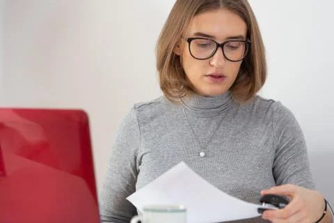 Woman stapling documents. Stock Photos