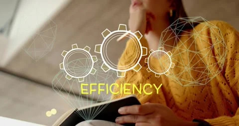Woman starting notes on notebook for work, sparking yellow EFFICIENCY gears and Stock Footage 330562831