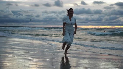 Woman stepping on the sandy beach Stock Footage 156818129