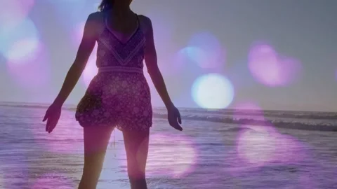 Woman stepping into sea causing pullback and opening arms, embracing horizon Video stock 333336870