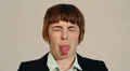 Woman sticking out tongue like a spoilt child HD Footage