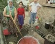 Woman stirring pot of stew SD Footage