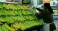 Woman Stocking Bananas HD Footage