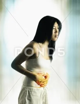 Woman with stomach ache Stock Photos