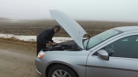 Woman Stranded on road Stock Footage 72085010