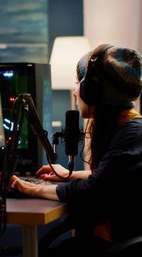 Woman streamer checking sound using professional mixer Stock Photos