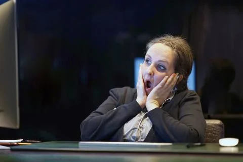 Woman in stress in front of computer Stock Photos