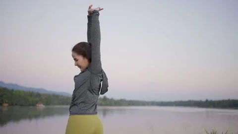 Woman stretching before exercise Stock Footage 170590789