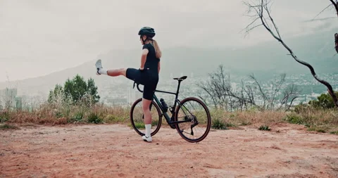 Woman, stretching legs and bike for Stock Video Pond5