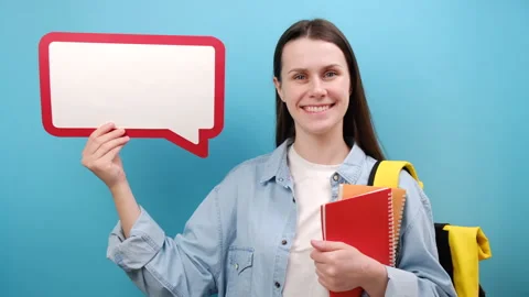 Woman student with backpack hold notebooks empty blank Say cloud, speech bubble Stock Footage 264163802