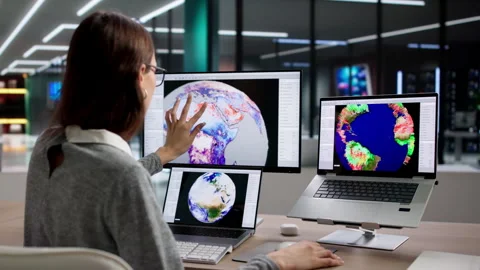 Woman Studies Weather Map On Computer Stock Footage 334532576