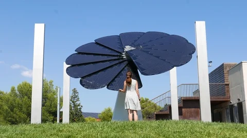 Woman study and touch solar panel Stock Footage 94957430