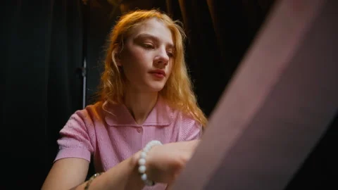 Woman Studying Theater Script Backstage for Drama Rehearsal Stock Footage 344527434