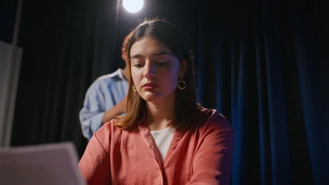 Woman Studying Theater Script during Drama Rehearsal on Stage Stock Footage 344524896