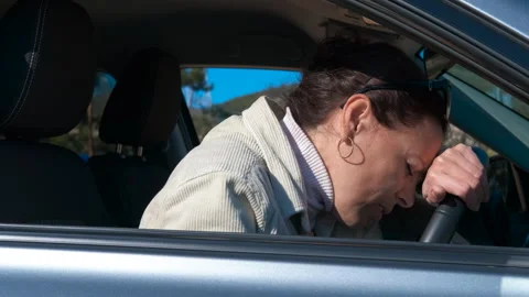 Woman suffering heart attack inside car. Stock Footage 328083130
