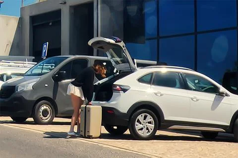 A woman with a suitcase Stock Photos