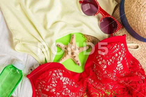Woman summer outfit top view on color background. Fashion vacations concept Stock-Fotos