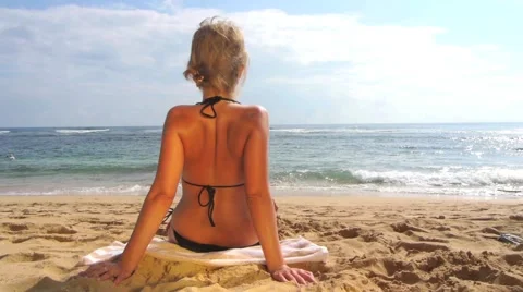 Woman Sunbathing Stock Footage 1045376