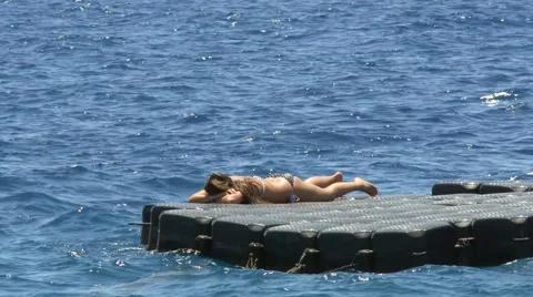 Woman sunbathing Stock Footage 40215956