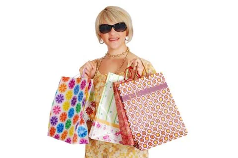 Woman with sunglasses and shopping bag.JPG Stock Photos