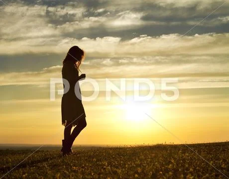 Woman at Sunset Stock Photos