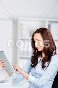 Woman surfing on her tablet computer Stock Photos