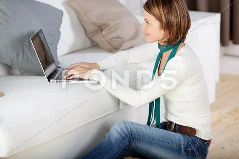 Woman surfing the internet Stock Photos