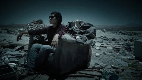 Woman surrounded by garbage Stock-Footage 84670904