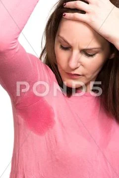 Woman sweating very badly under armpit Stock Photos