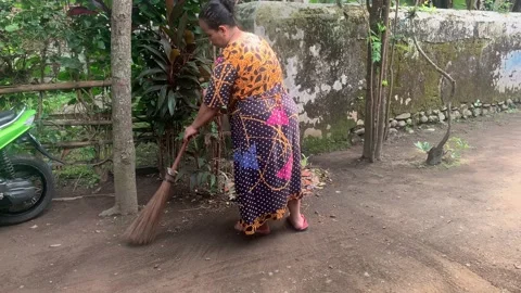 Woman sweeping Stock Footage 219374477