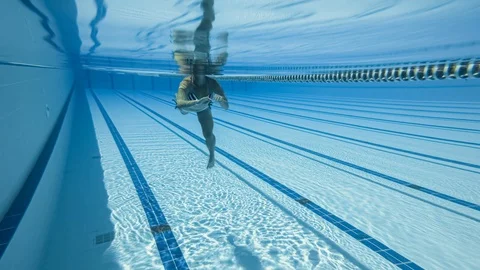 Woman swimming in the poolin the olympic... | Stock Video | Pond5