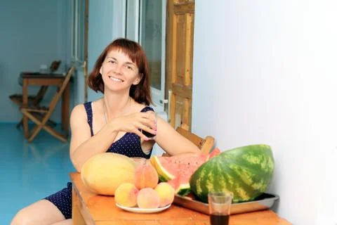 Woman at the table Stock Photos