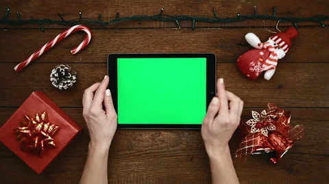 Woman with tablet pc at decorated table Stock Footage 68631191