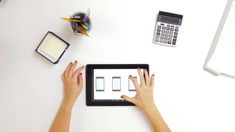 Woman with tablet pc working on interface design Stock Footage 102458665