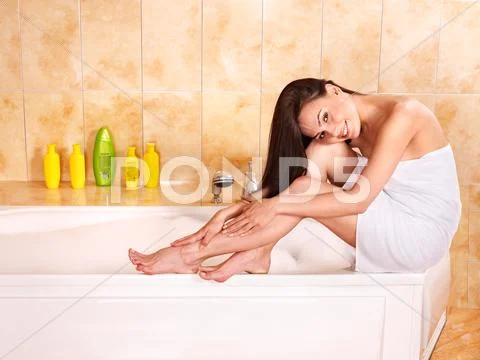 Woman take bubble bath. Stock Photos