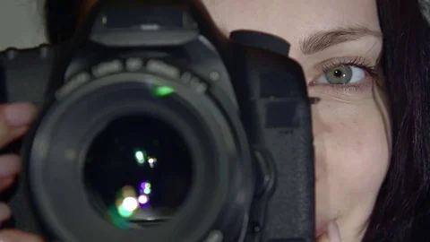 A woman takes on the camera Stock-Footage 77400906