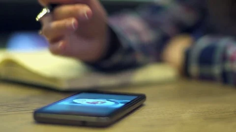 Woman takes notes in a notebook Stock Footage 73089891