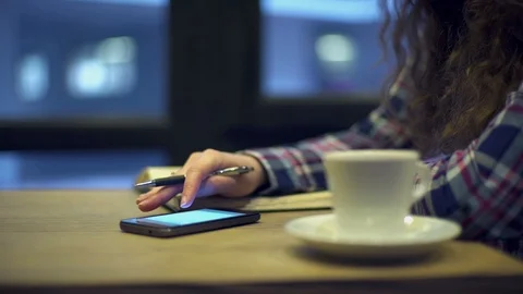 Woman takes notes in a notebook Stock Footage 114753295