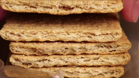 Woman takes one cookie from the stack Stock Footage 311128549