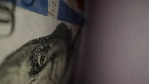 A Woman Takes A Stack Of Dollars From An Envelope And Counts Them, Dolly Zoom Stock Footage 277583311