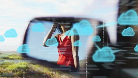 Woman taking call by car cloud icons bits appearing then receding in mirror Stock Footage 334322227