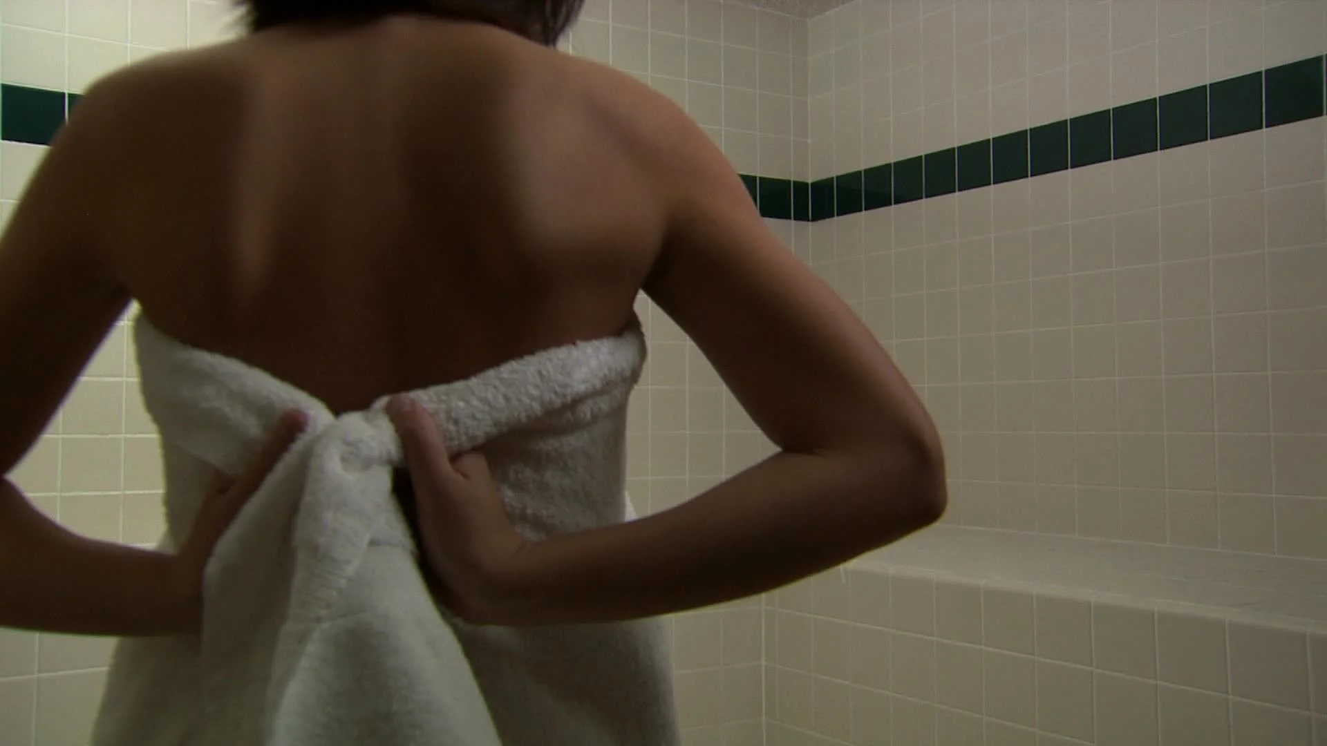 Girl removing towel