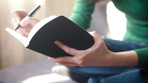 Woman Taking Notes Stock Footage 73887084