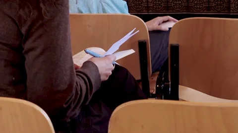 Woman is taking notes by hand on block notes: conference, audience, press Stock Footage 28204661