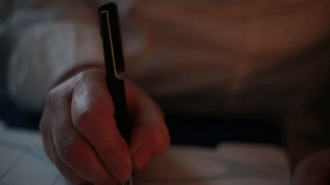 Woman Taking Notes Scheduling Activities in her Calendar Stock Footage 127140194