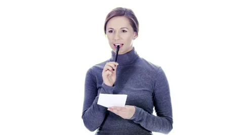 Woman taking notes on white background 스톡 동영상 32958874