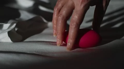 Woman taking pulse vibrating stimulator ... | Stock Video | Pond5