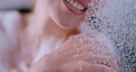 Woman taking a shower Stock Footage 158368219